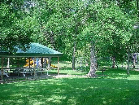 City Park with Picnic Tables and Swings